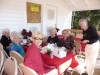 maryann-weenen-greeting-guests-on-the-porch